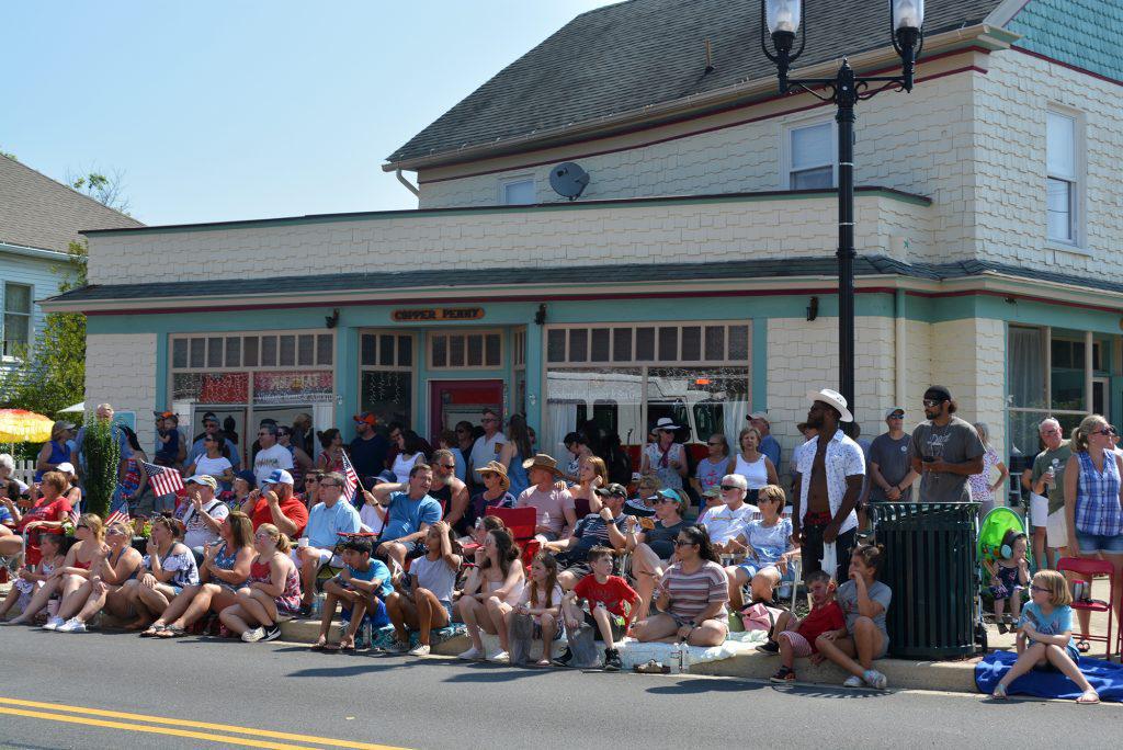 Spectators watch the annual 4th of July Parade on Main Street
