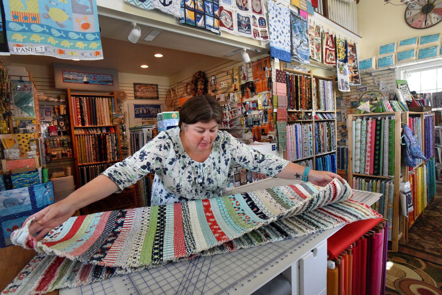 Stop by Village Quilting for for unique fabrics and quilting supplies