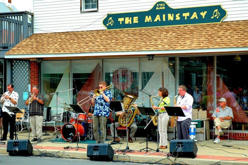 Musicians perform outside The Mainstay during Fallfest